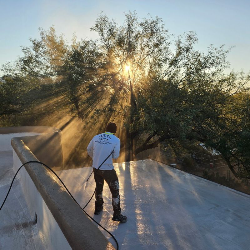 Roof Coating Technician Power Washing Roof
