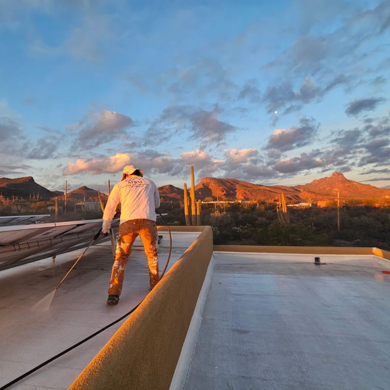 Roof Expert Power Washing Roof in Tucson