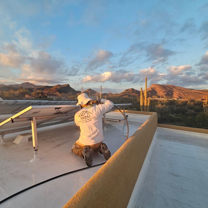 Technician Working on Solar Panels